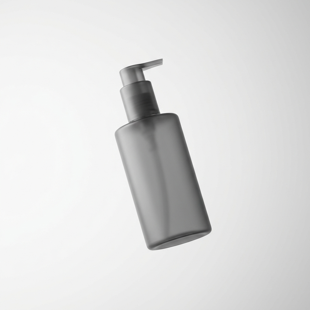 Minimalist translucent pump bottle — men's face serum editorial
